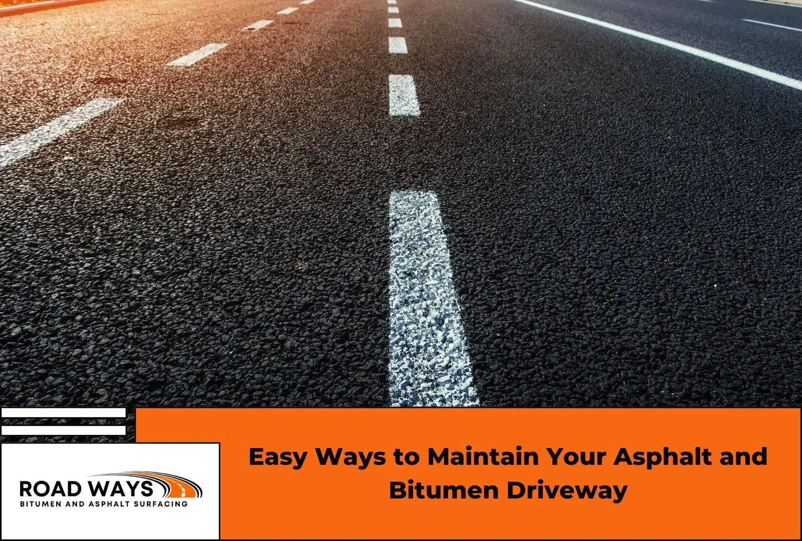 A well-maintained asphalt driveway in good condition