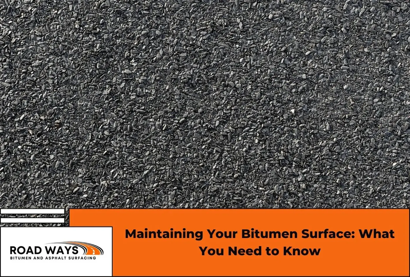 A bitumen surface being maintained and inspected